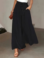 Pantalón Fluido de Pierna Ancha con Cintura Elástica de Lunares