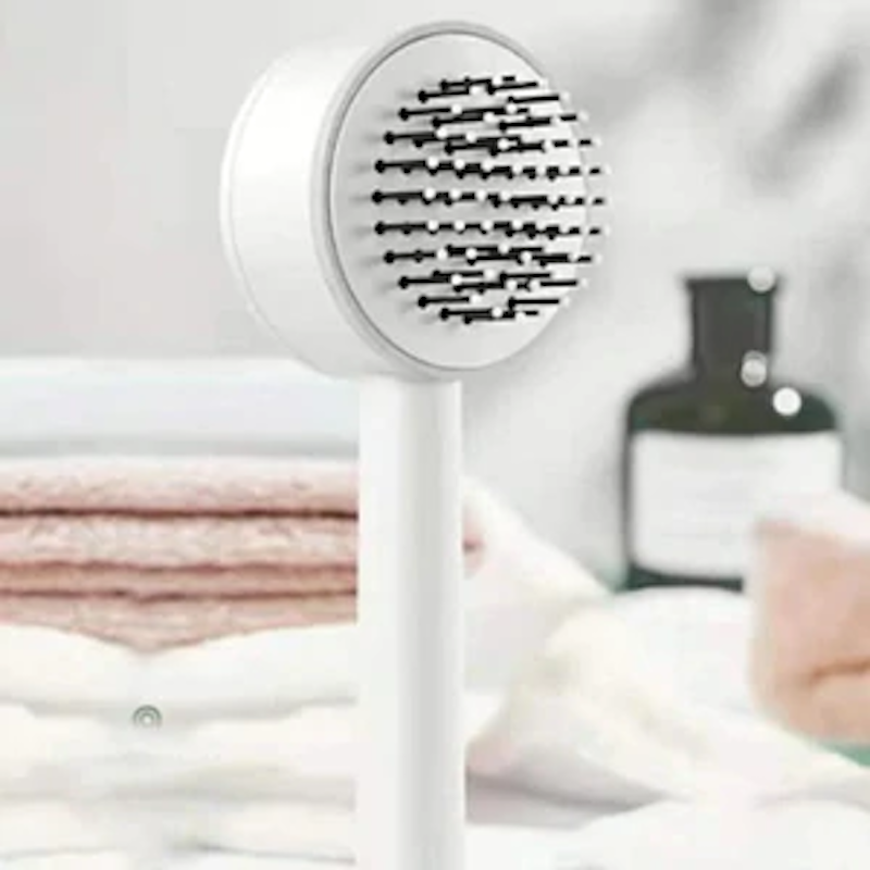 Brosse à cheveux autonettoyante