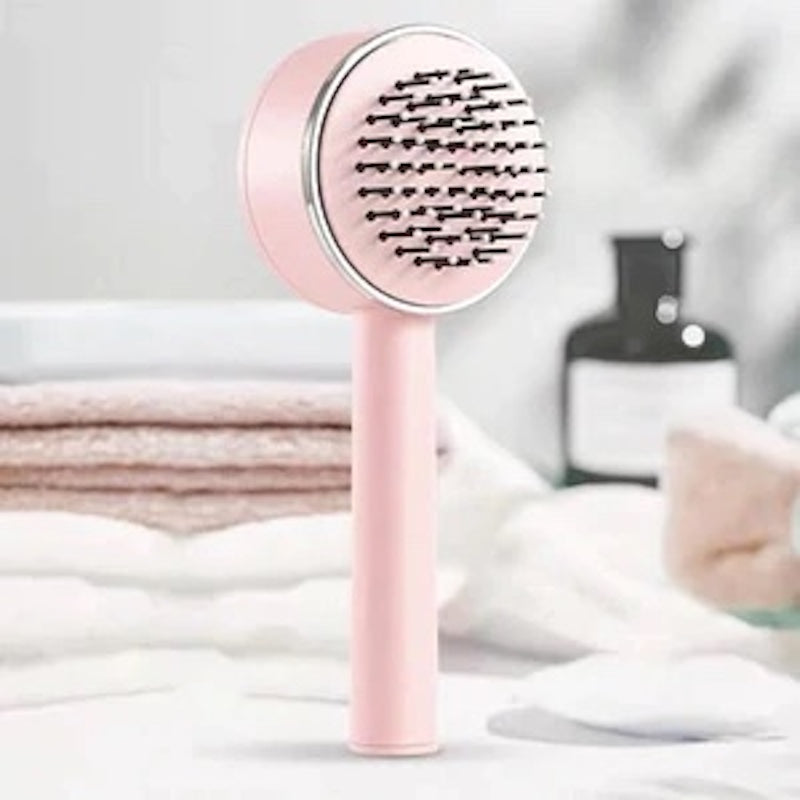 Brosse à cheveux autonettoyante